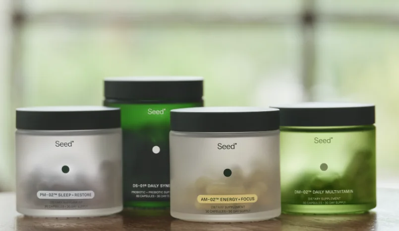 Four Seed supplement jars, including the DS-01 daily synbiotic